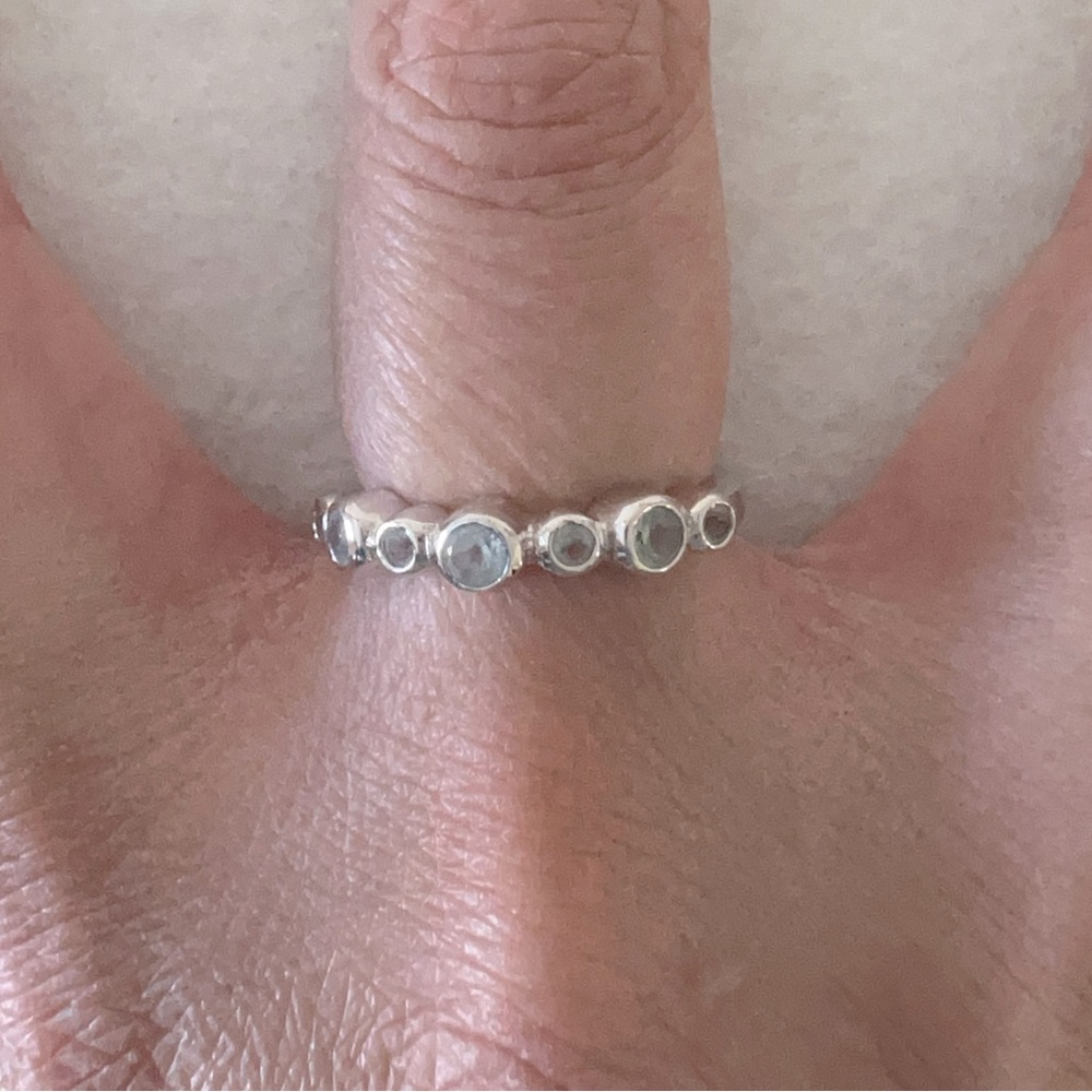 Stainless steel ring with light turquoise stones